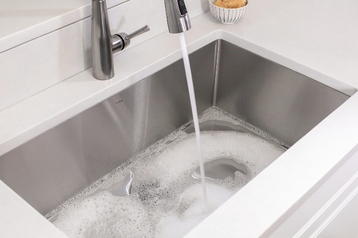 how to clean kitchen sink drain smell with soapy water