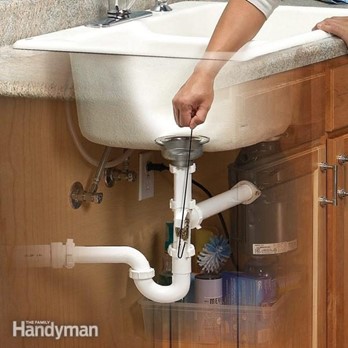 how to fix a clogged bathroom sink with a coat hanger